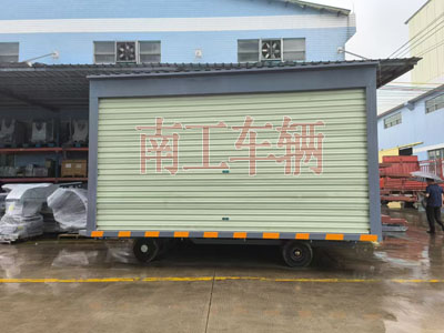 10吨箱式华亿手机平台-华亿（中国）两侧带卷帘门3I.jpg